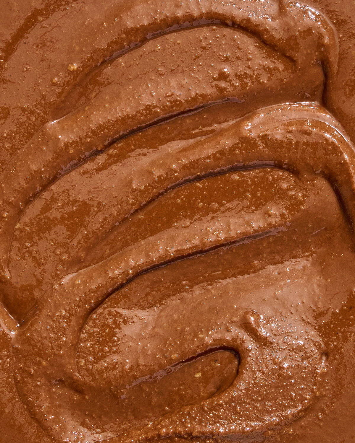 A close-up texture shot of our chocolate walnut butter. 